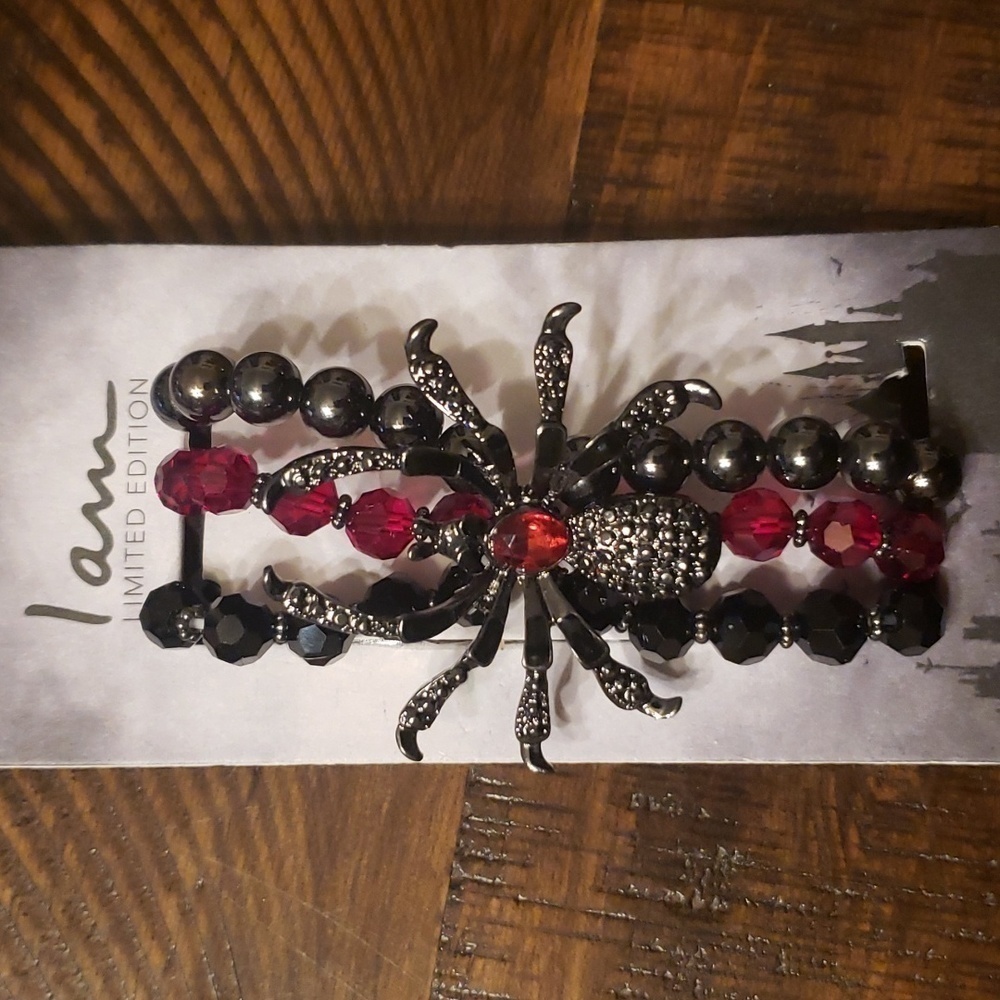 I am limited edition glass bead and spider bracelet